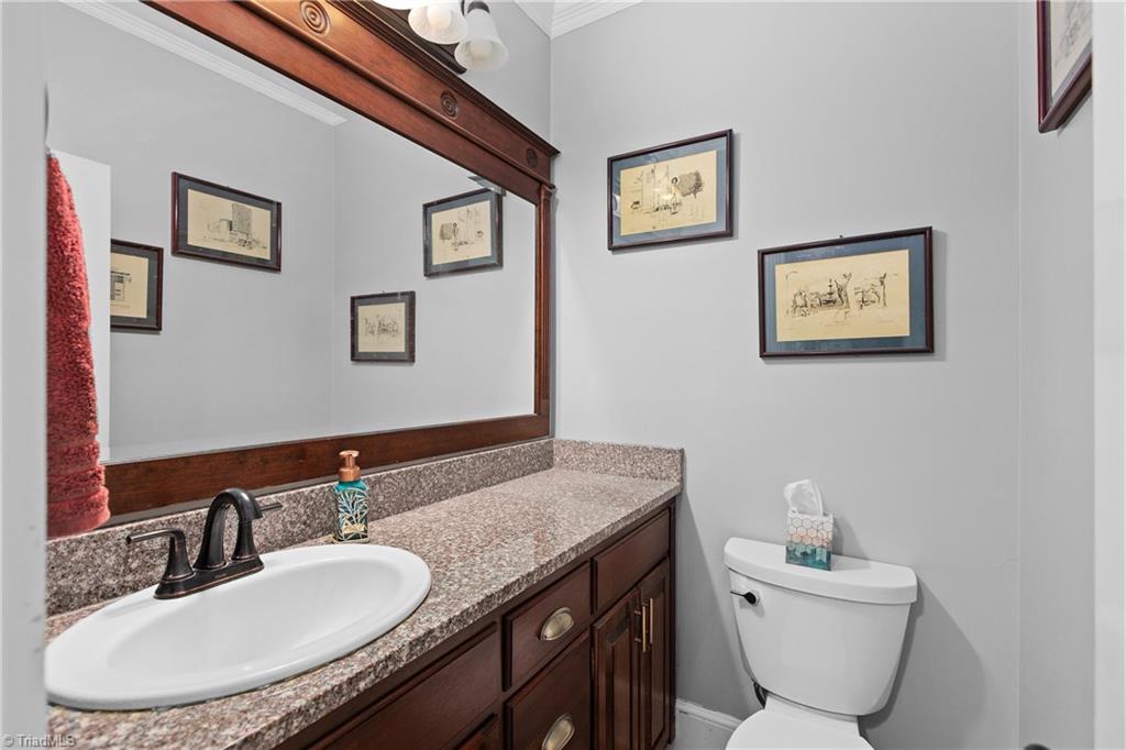 4112 St Johns Street High Point, NC 27265 - Photo 19 of 44 Main level half bath