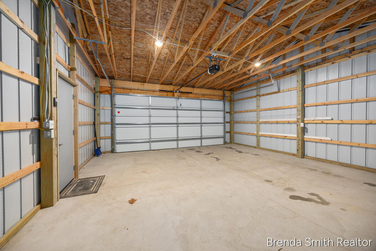 12587 Maston Lake Road Sand Lake, MI 49343 - Photo 28 of 36 Garage