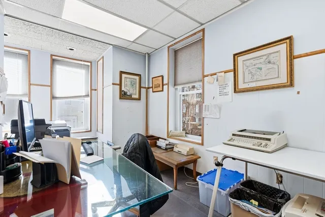 a room with furniture and window