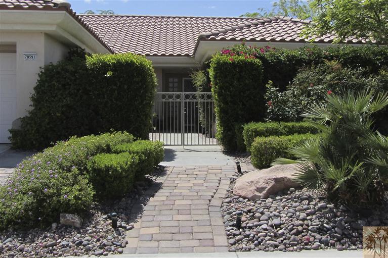 78591 Dancing Waters Road Palm Desert, CA 92211 - Photo 3 of 17 a view of a garden