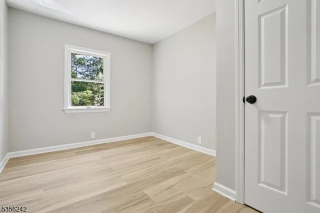 a view of a room that has a window in it