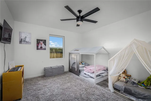 a bathroom with a sink double vanity and shower