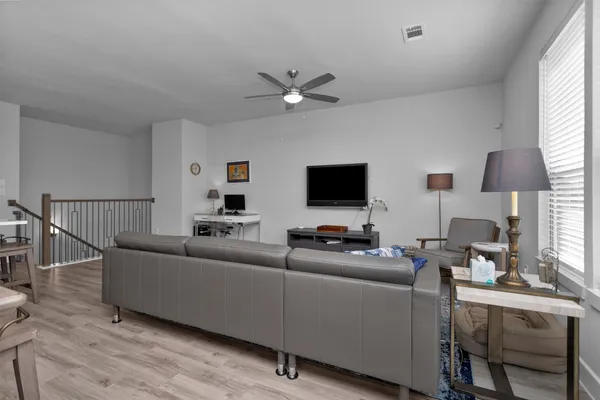 a kitchen with a sink and refrigerator