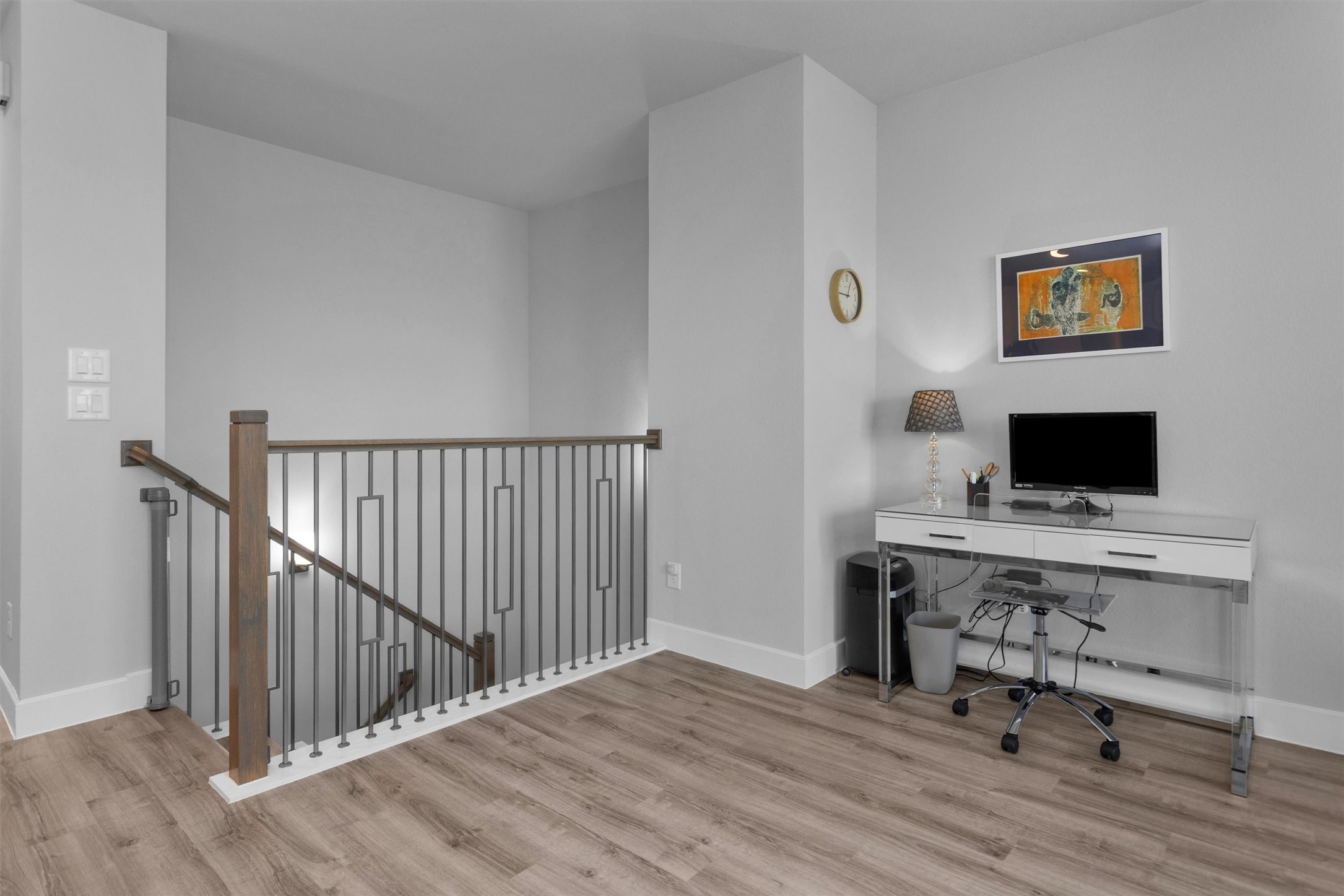 454 South Centro Circle Conroe, TX 77385 - Photo 17 of 34 a view of a workspace with wooden floor and wardrobe