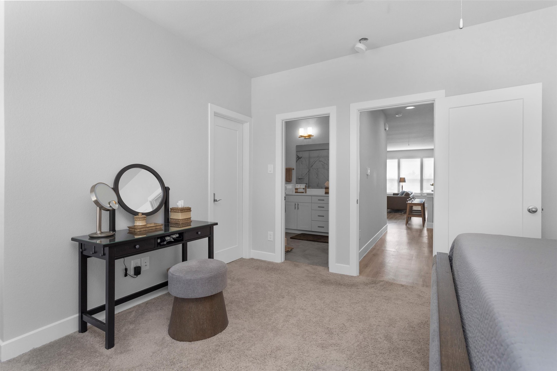 454 South Centro Circle Conroe, TX 77385 - Photo 27 of 34 a living room with furniture and a wooden floor