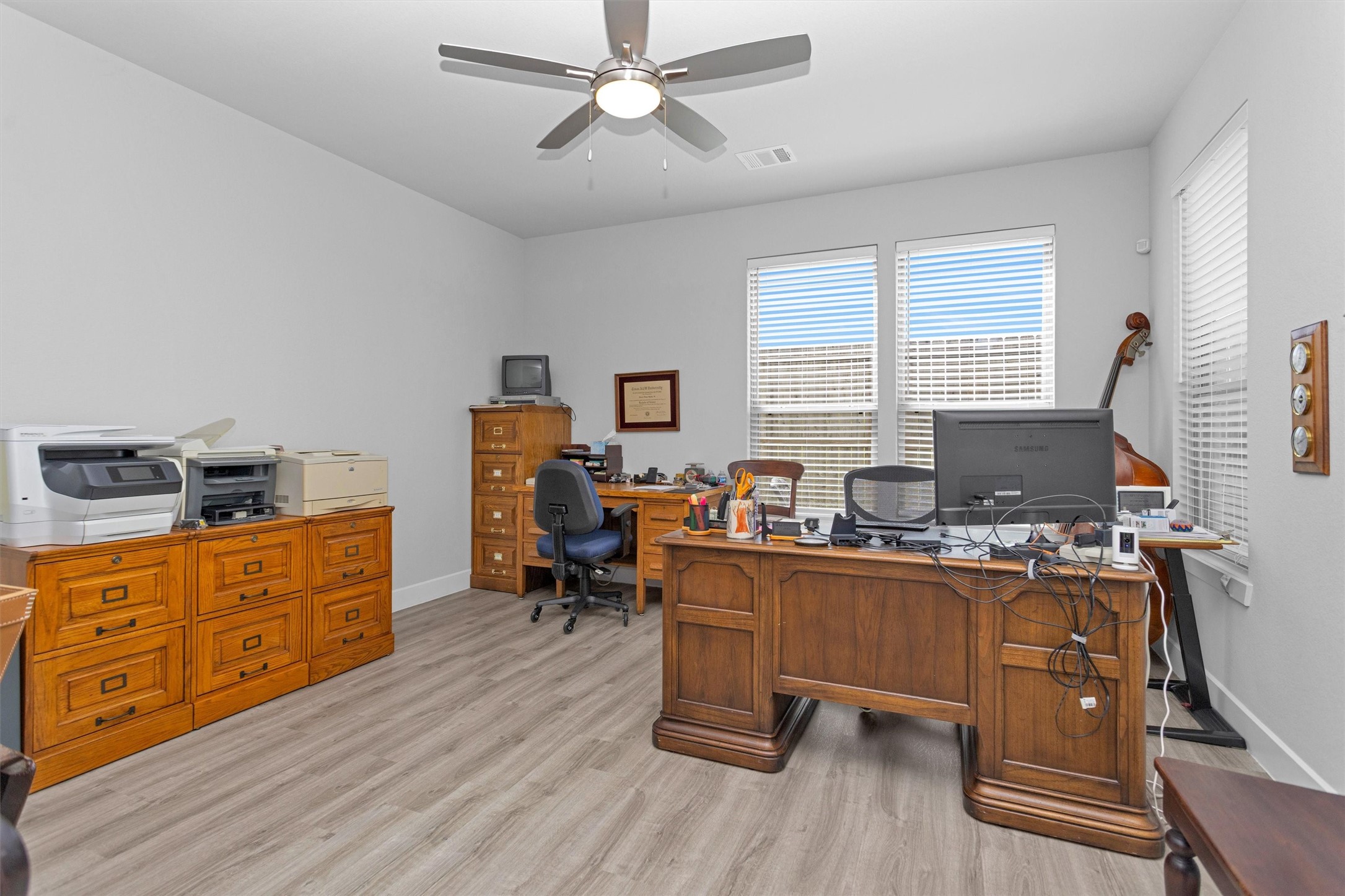 454 South Centro Circle Conroe, TX 77385 - Photo 6 of 34 a view of a workspace with furniture and a window