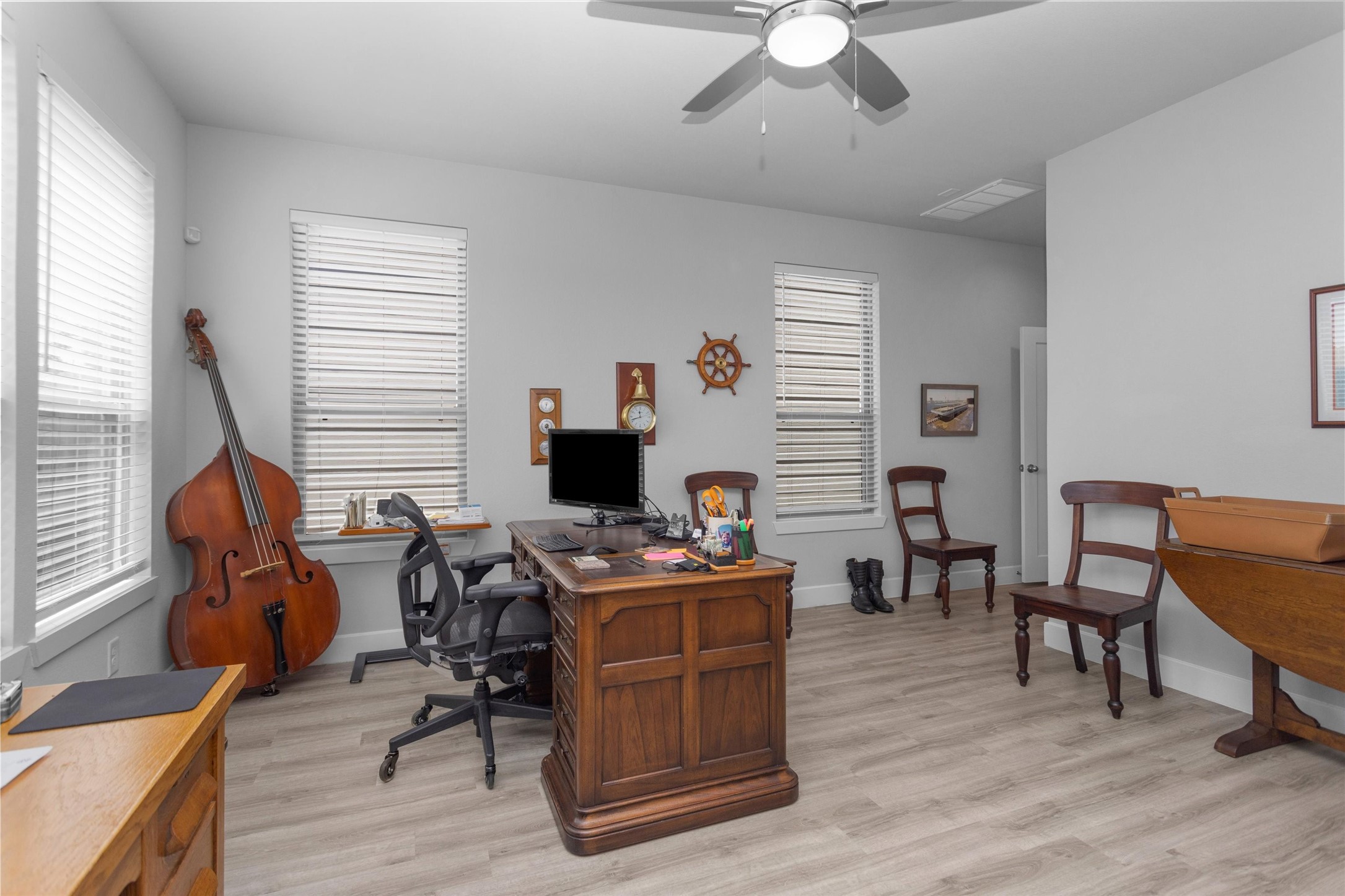 454 South Centro Circle Conroe, TX 77385 - Photo 7 of 34 a view of a workspace with furniture and a window