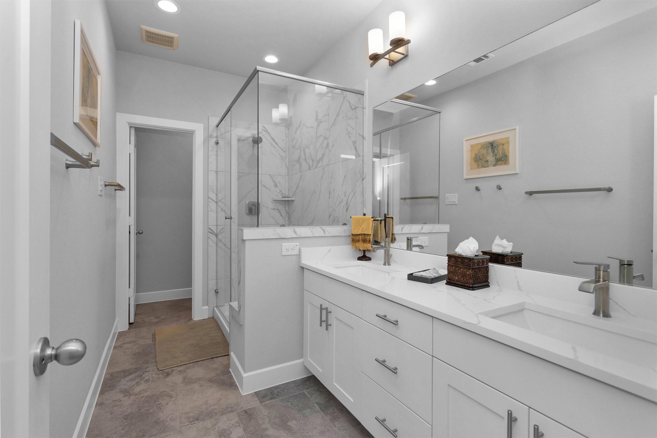 454 South Centro Circle Conroe, TX 77385 - Photo 9 of 34 a spacious bathroom with a granite countertop sink a mirror a shower and a bathtub
