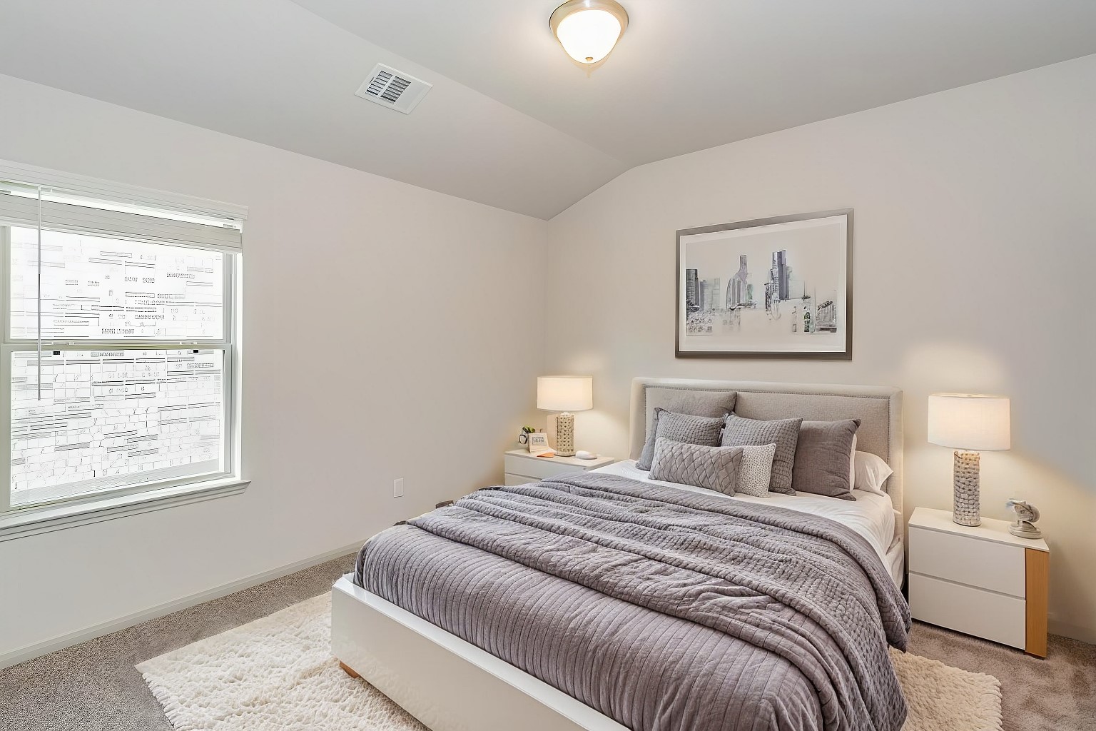 6447 Escondido Drive Rosharon, TX 77583 - Photo 5 of 16 This bright and cozy bedroom offers a peaceful retreat with plush carpeting and a large window that brings in natural light. The neutral palette and spacious layout provide the perfect blank canvas for personalization. Whether used as a guest room, office, or kids' room, this space promises comfort and versatility.