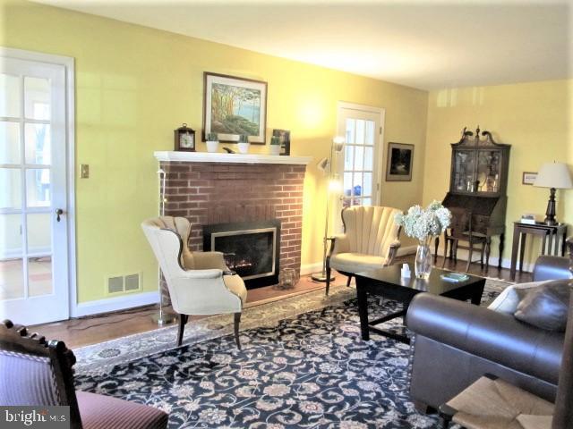 513 Forest View Road Linthicum, MD 21090 - Photo 5 of 47 Welcoming living room featuring gas FP!