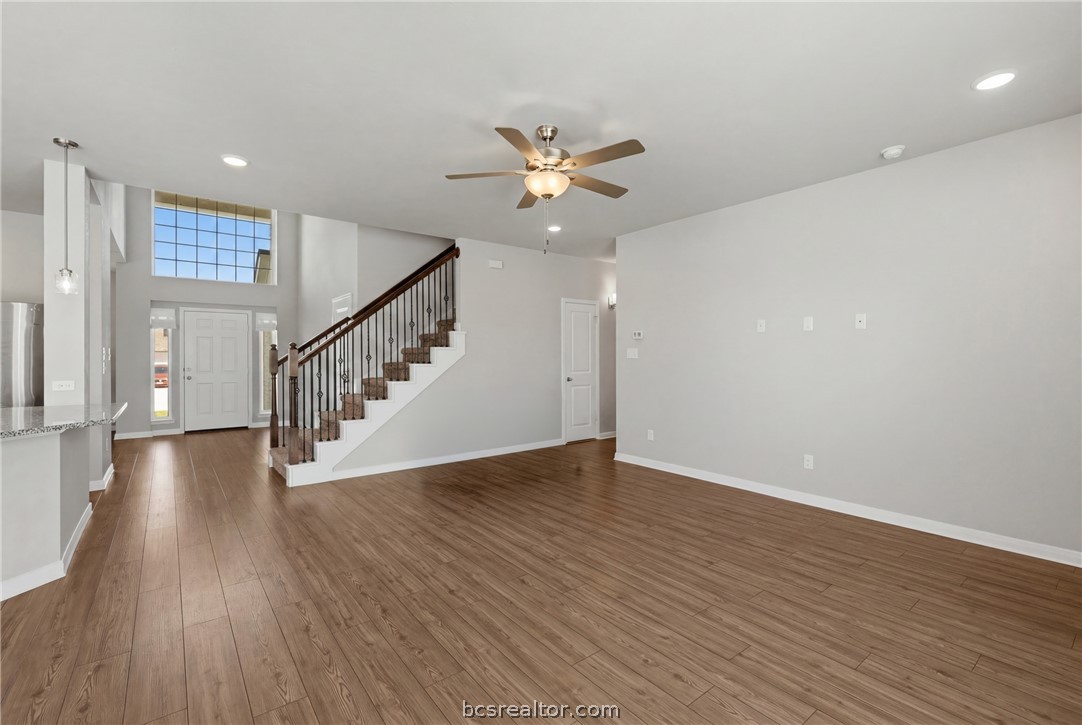 1922 Viva Road Bryan, TX 77807 - Photo 9 of 45 Inviting open-concept living room offering a spacious and connected layout.