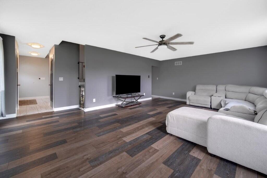 809 West 126th Court Crown Point, IN 46307 - Photo 11 of 47 a living room with furniture and a flat screen tv
