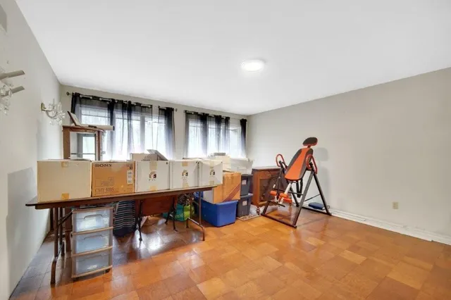 a room with furniture and musical instruments
