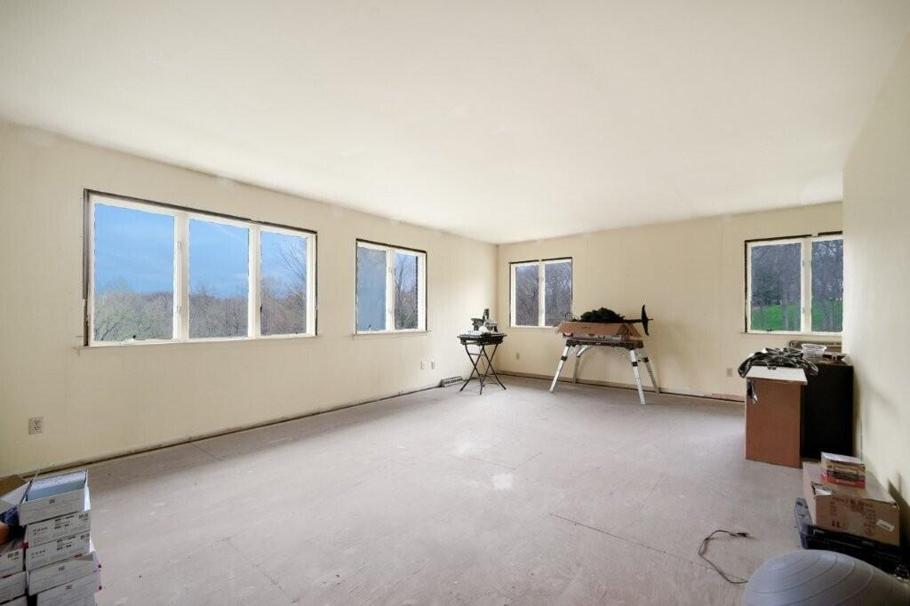 809 West 126th Court Crown Point, IN 46307 - Photo 24 of 47 a living room with furniture and a window