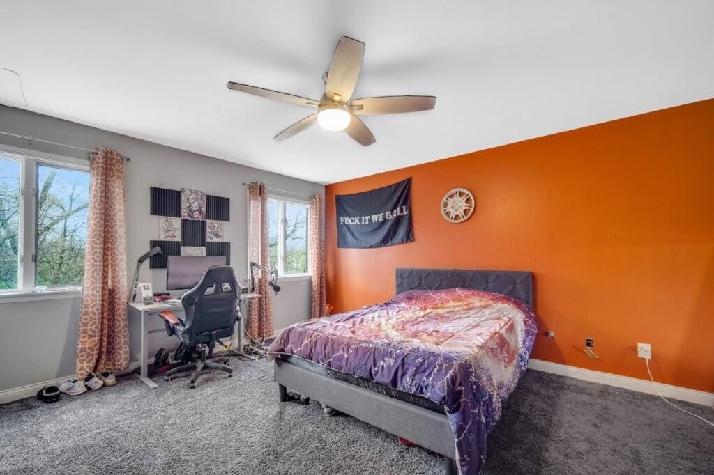 809 West 126th Court Crown Point, IN 46307 - Photo 29 of 47 a bedroom with a bed and a window