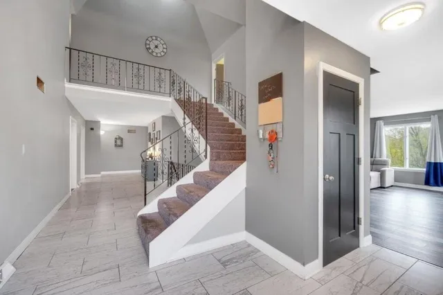 a view of entryway livingroom and hall