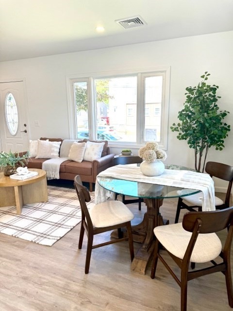 102 Crawford Street Fall River, MA 02724 - Photo 12 of 28 a dining room with furniture window and wooden floor