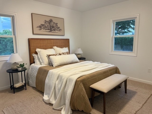 102 Crawford Street Fall River, MA 02724 - Photo 15 of 28 a bedroom with a bed and a painting on the wall