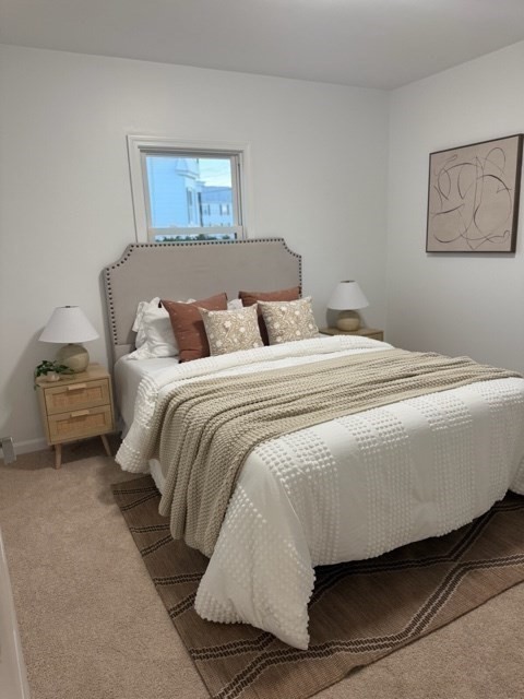 102 Crawford Street Fall River, MA 02724 - Photo 17 of 28 a bedroom with a bed and painting on the wall