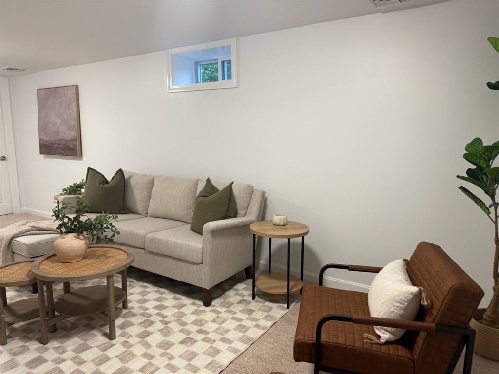 102 Crawford Street Fall River, MA 02724 - Photo 21 of 28 a living room with furniture and a couch