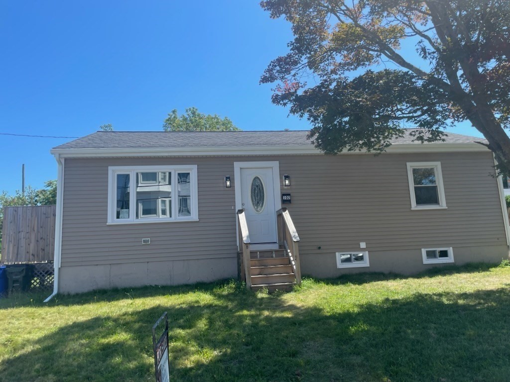 102 Crawford Street Fall River, MA 02724 - Photo 26 of 28 a backyard of a house with lots of green space