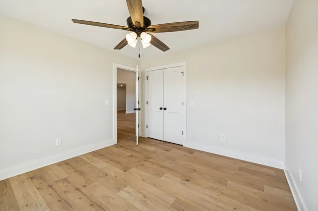 an empty room with fan