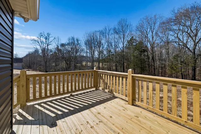 a view of a wooden roof deck