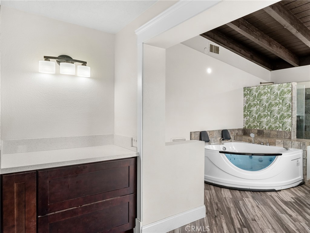 15485 Chole Road Apple Valley, CA 92307 - Photo 36 of 60 a bathroom with a sink and a mirror