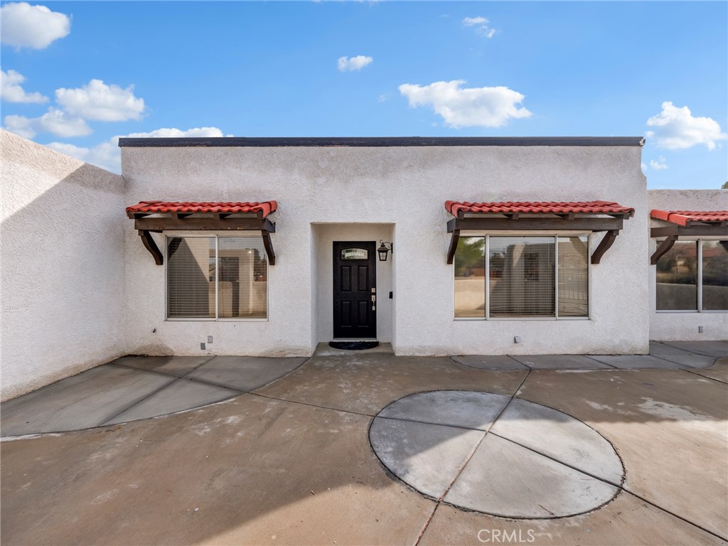 15485 Chole Road Apple Valley, CA 92307 - Photo 40 of 60 a view of a house with a garage
