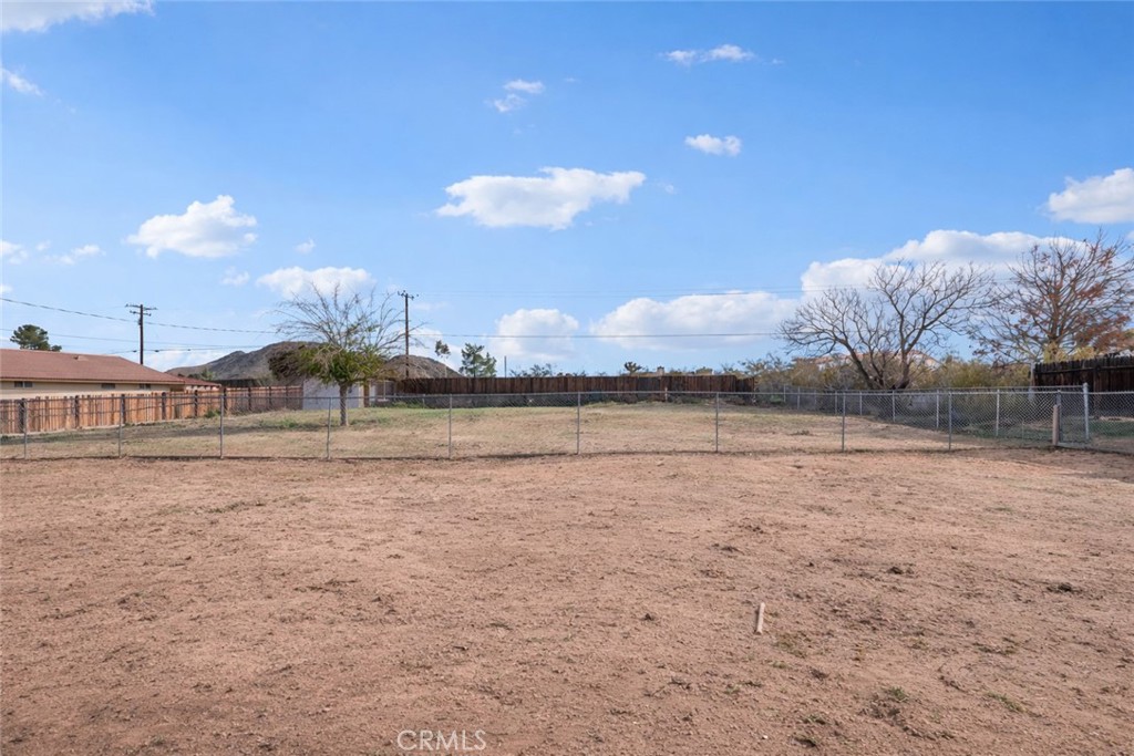 15485 Chole Road Apple Valley, CA 92307 - Photo 42 of 60 a bathroom with a sink and a mirror