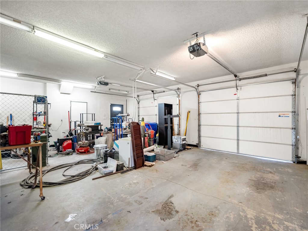 15485 Chole Road Apple Valley, CA 92307 - Photo 48 of 60 a view of a room with gym equipment