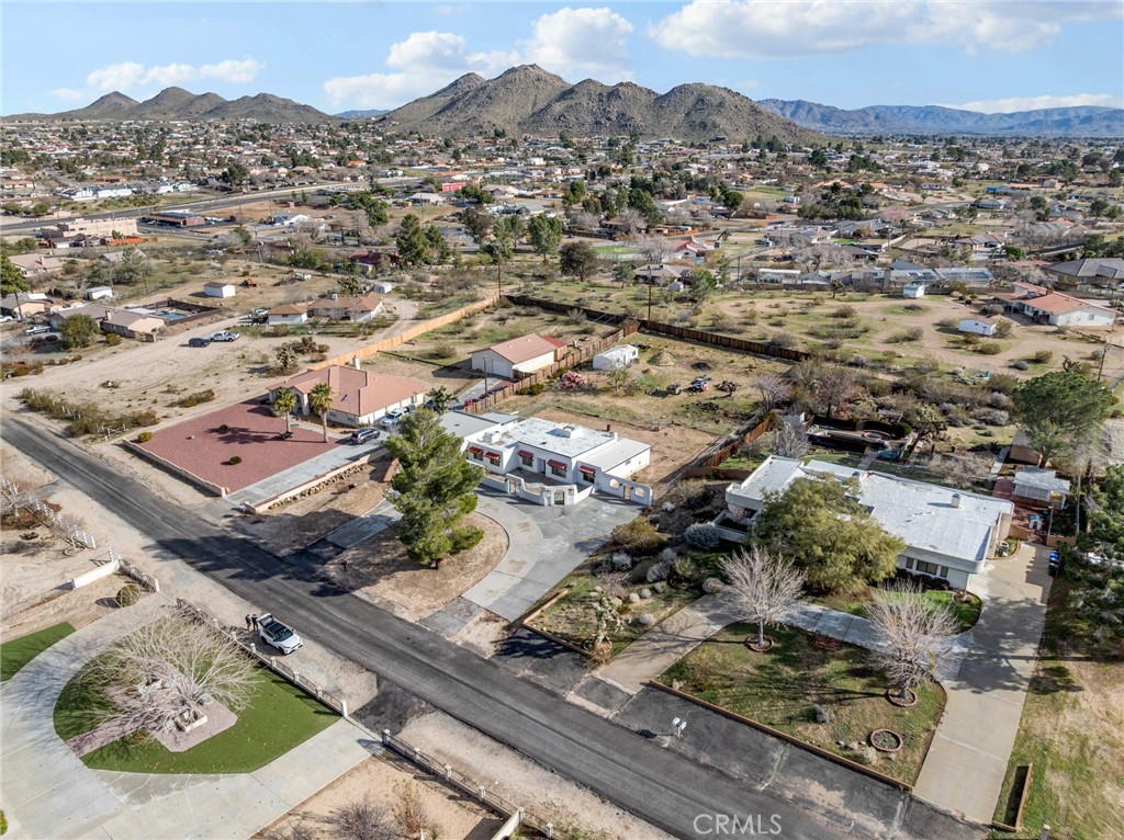 15485 Chole Road Apple Valley, CA 92307 - Photo 55 of 60 an aerial view of residential houses with outdoor space