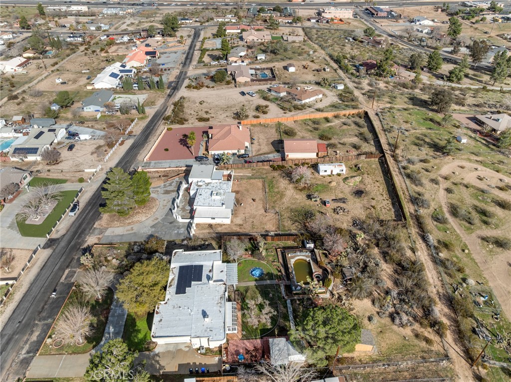 15485 Chole Road Apple Valley, CA 92307 - Photo 58 of 60 an aerial view of residential houses with outdoor space