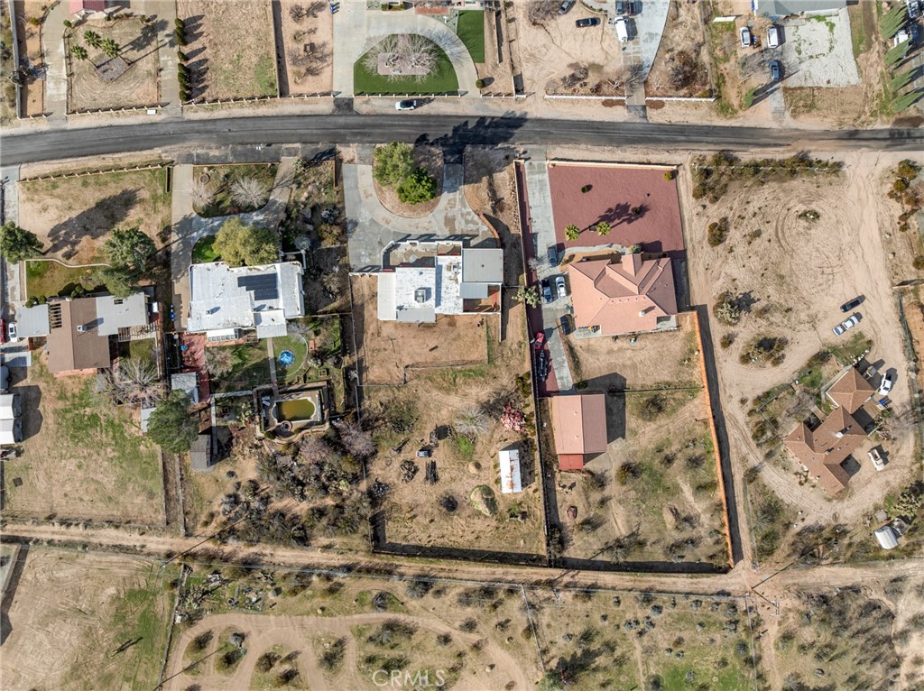 15485 Chole Road Apple Valley, CA 92307 - Photo 60 of 60 a view of a fireplace in a living room