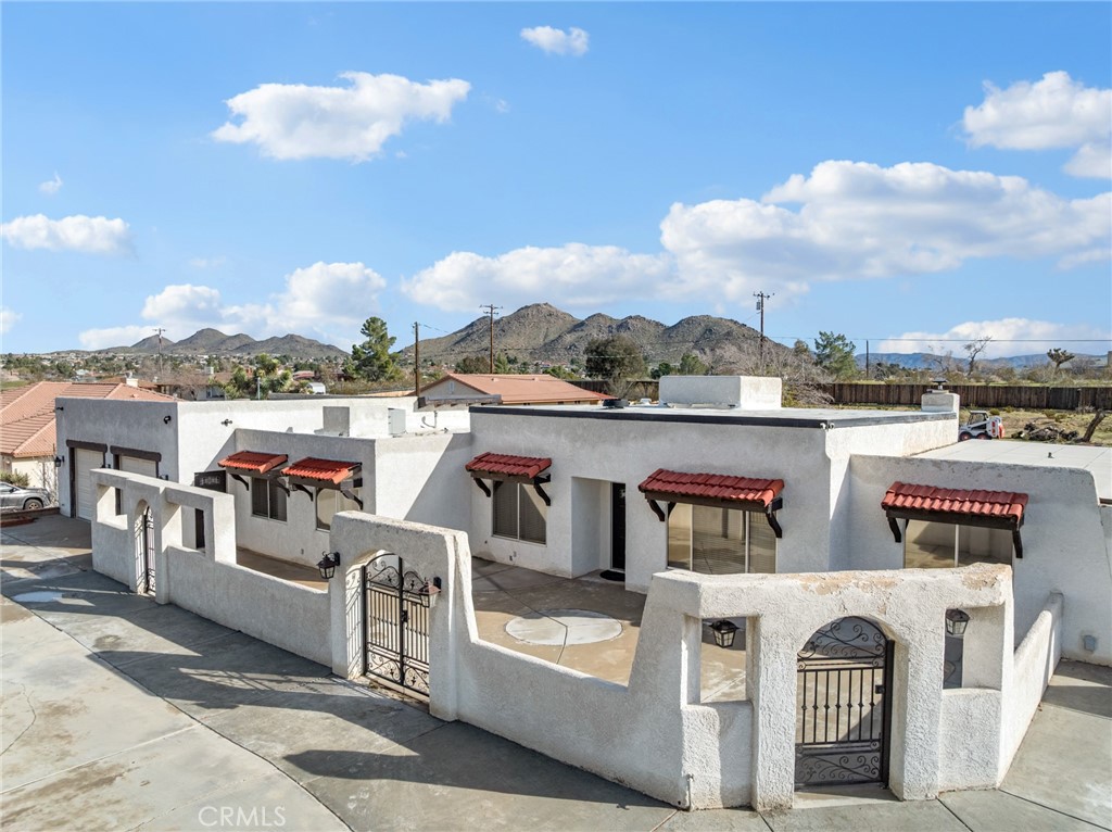 15485 Chole Road Apple Valley, CA 92307 - Photo 7 of 60 a view of a white couches in the roof deck