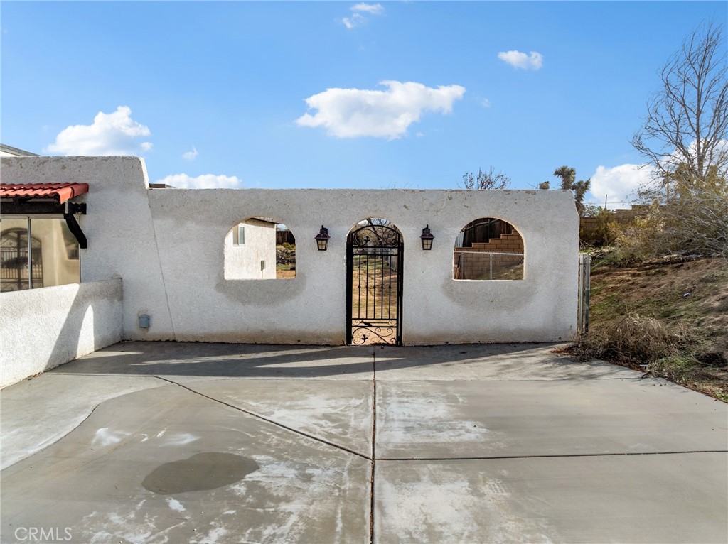 15485 Chole Road Apple Valley, CA 92307 - Photo 9 of 60 a view of a livingroom with a garage