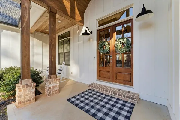 a bathroom with a sink toilet and a mirror
