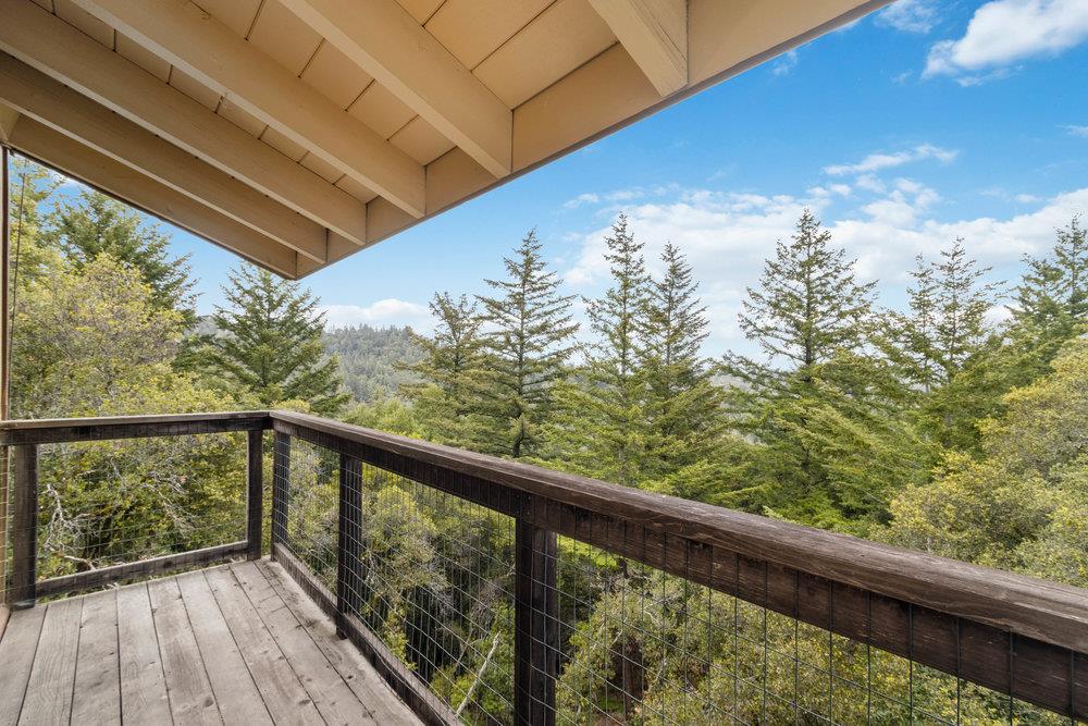 22101 Miller Ridge Road Los Gatos, CA 95033 - Photo 25 of 76 a view of a balcony with wooden floor