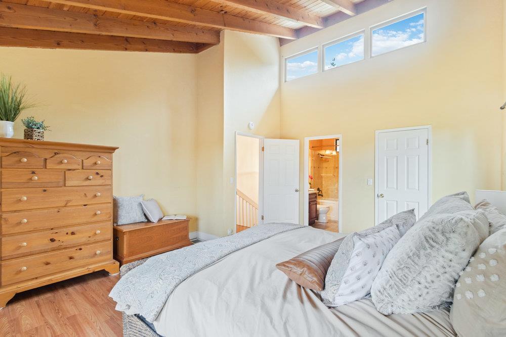22101 Miller Ridge Road Los Gatos, CA 95033 - Photo 30 of 76 a bedroom with a bed and furniture