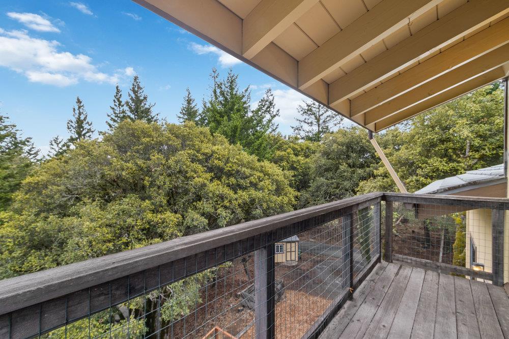 22101 Miller Ridge Road Los Gatos, CA 95033 - Photo 33 of 76 a view of a balcony with wooden floor