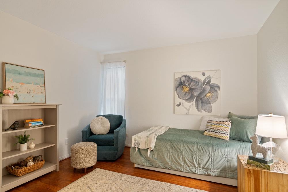 22101 Miller Ridge Road Los Gatos, CA 95033 - Photo 38 of 76 a bedroom with a bed and a large window