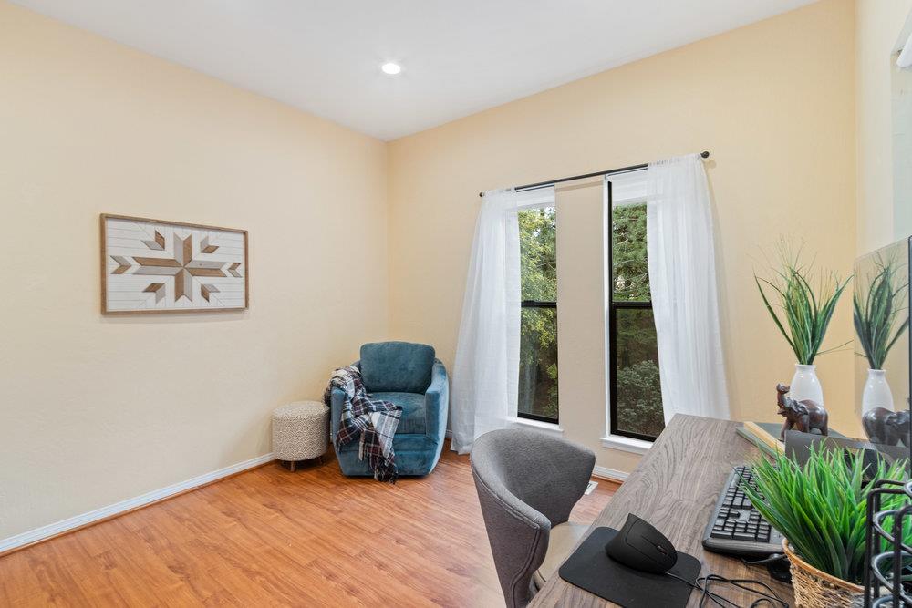 22101 Miller Ridge Road Los Gatos, CA 95033 - Photo 41 of 76 a living room with furniture and a large window