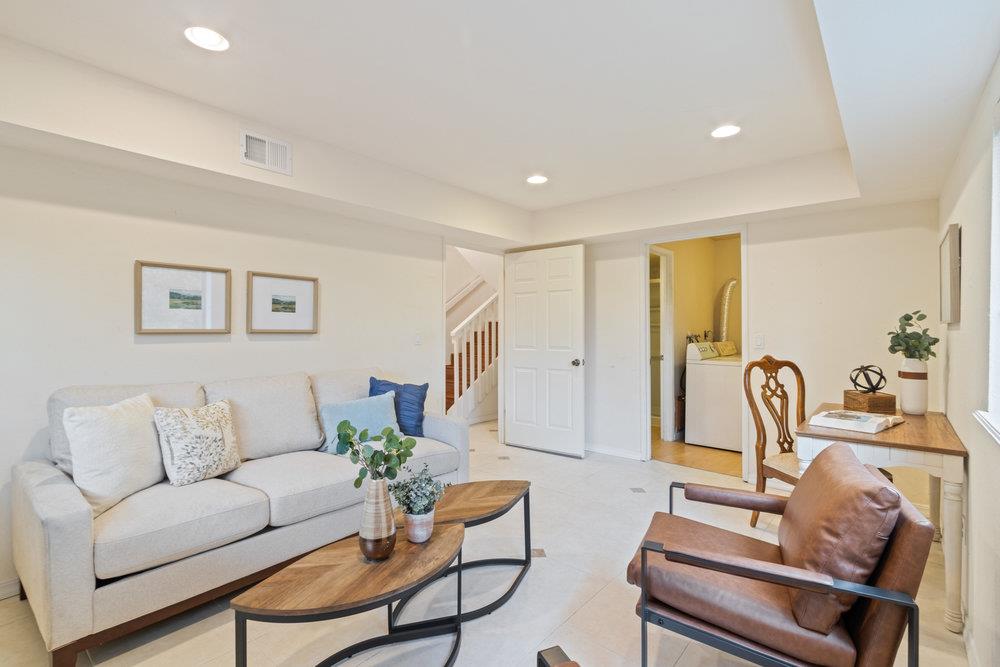 22101 Miller Ridge Road Los Gatos, CA 95033 - Photo 46 of 76 a living room with furniture