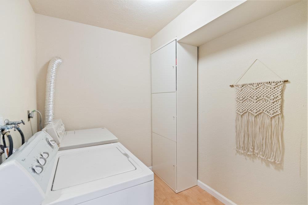 22101 Miller Ridge Road Los Gatos, CA 95033 - Photo 47 of 76 a utility room with dryer and washer