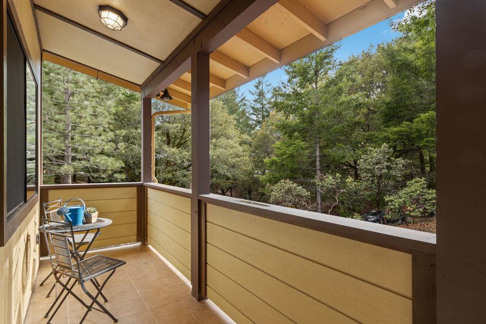 22101 Miller Ridge Road Los Gatos, CA 95033 - Photo 54 of 76 a view of a two chair in the balcony