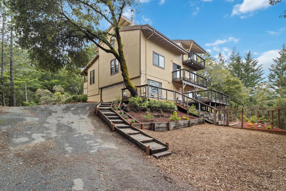 22101 Miller Ridge Road Los Gatos, CA 95033 - Photo 59 of 76 a view of a house with a yard