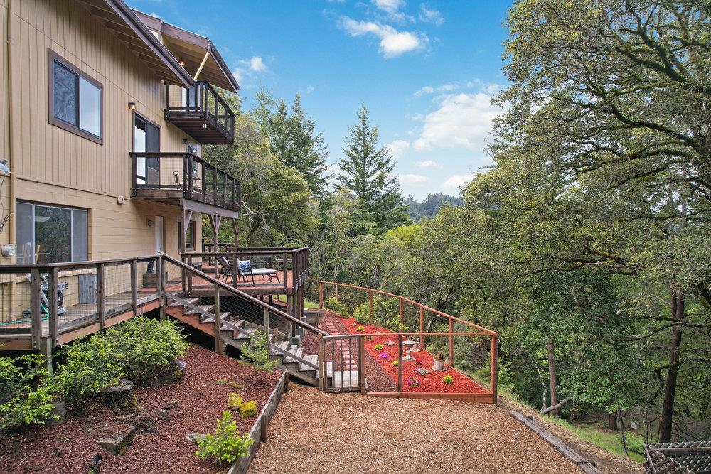 22101 Miller Ridge Road Los Gatos, CA 95033 - Photo 68 of 76 a view of a pathway with a wrought iron stairs