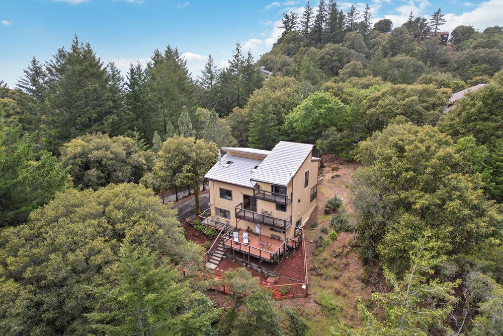 22101 Miller Ridge Road Los Gatos, CA 95033 - Photo 72 of 76 an aerial view of a house with a yard