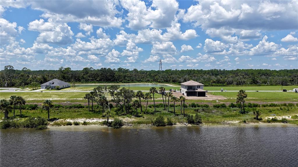 20 Coronado Road Flagler Beach, FL 32136 - Photo 12 of 15 a view of a lake with houses