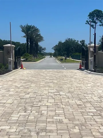 a view of a terrace with a garden and refrigerator